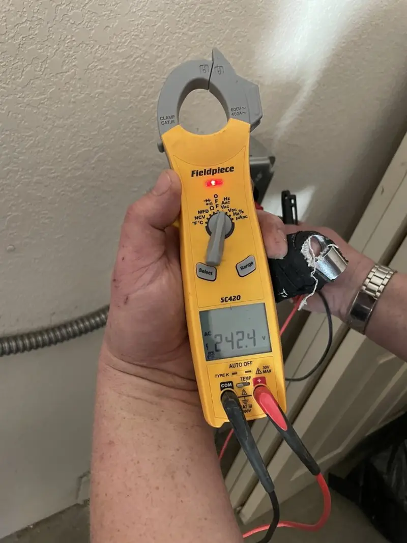 Voltage testing with clamp meter during Outlet Installation in Palmerton